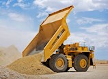 New Komatsu Dump Truck dumping dirt